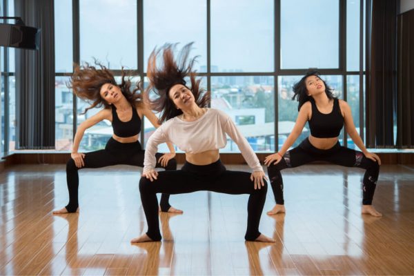 asian-women-shaking-hair-while-dancing-2021-08-26-19-52-52-utc.jpg